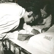 Dr Duke Duncan, Pediatrician, and Sue Rechner, Pediatric nurse, with infant